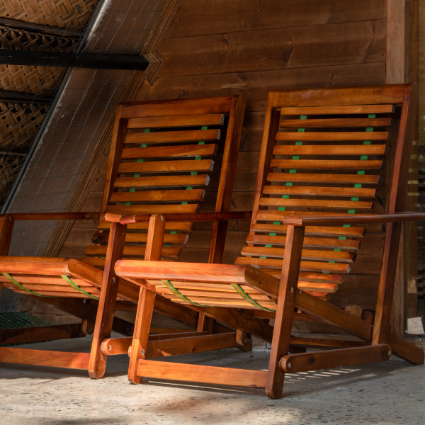 pair-of-rocking-chairs-on-cabana-porch-in-the-trop-2023-11-27-05-16-07-utcffs